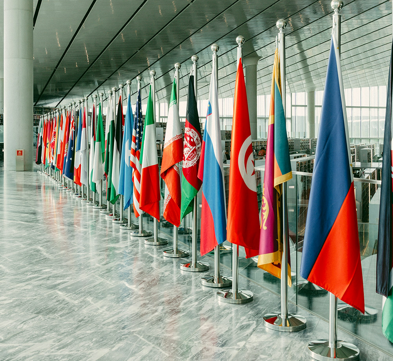 Government agency hall with international flags